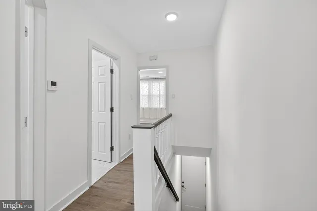 a view of a hallway with closet