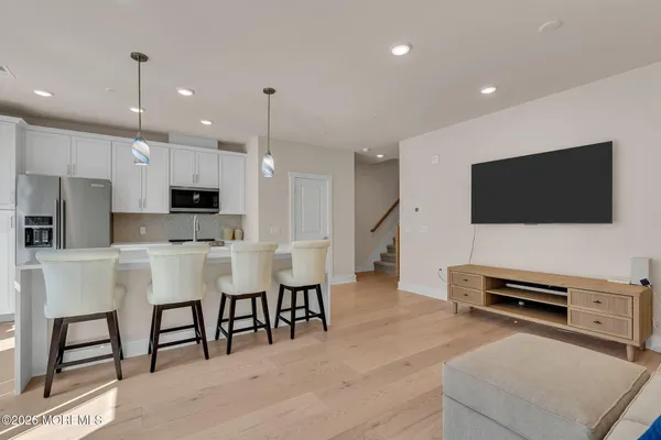 a view of a dining room and a sink