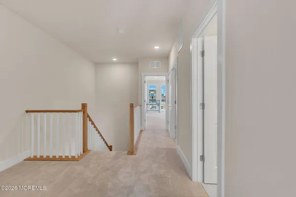 a view of hallway with stairs