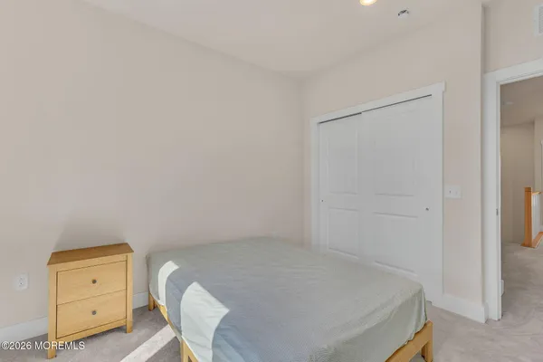 a view of storage and utility room with washer and dryer
