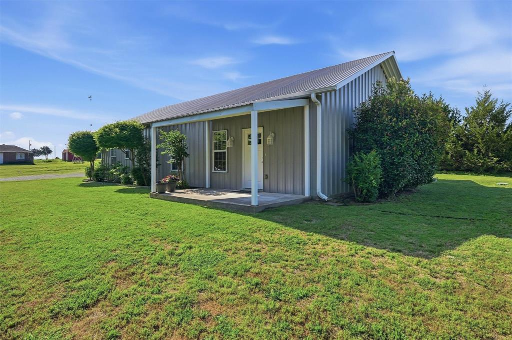 15656 South State Highway 78 Blue Ridge, TX 75424 - Photo 7 of 36 a view of a house with backyard and garden