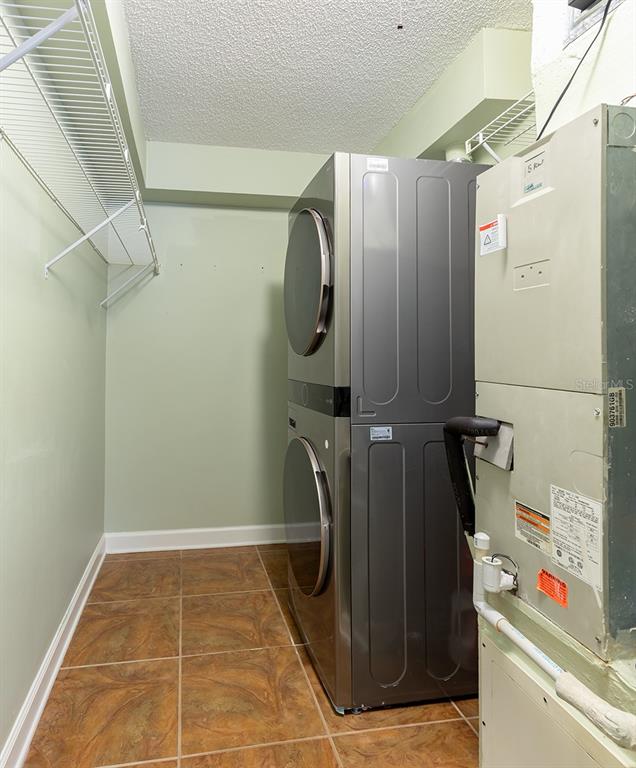4822 South Conway Road, Unit 127 Orlando, FL 32812 - Photo 12 of 15 a bathroom with a tub and shower
