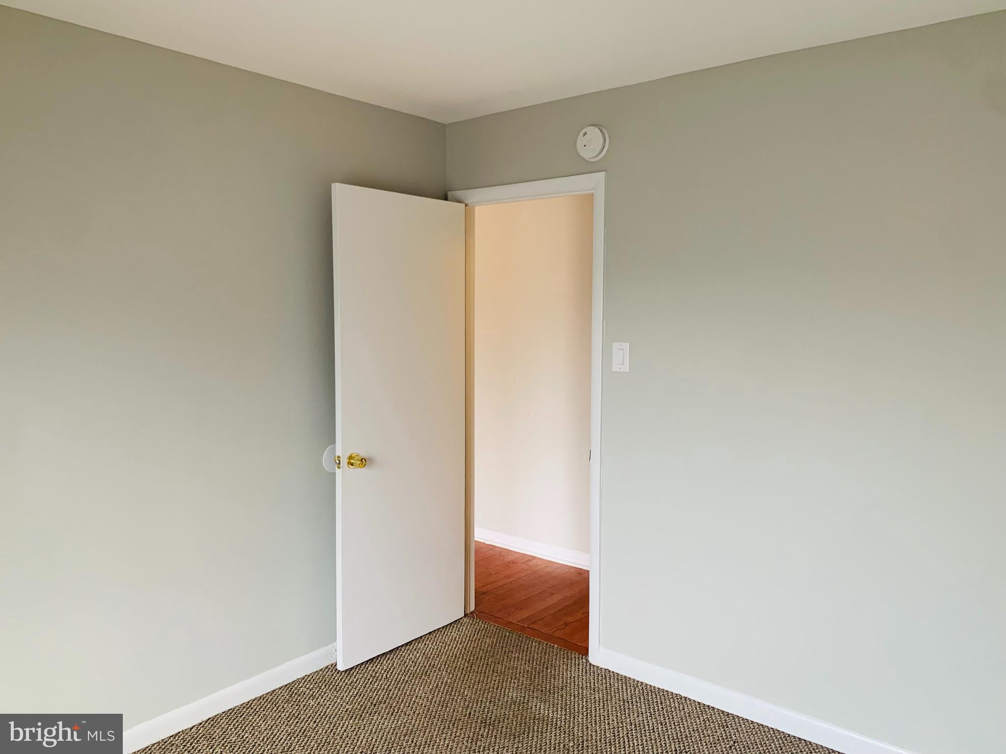 8875 Tamebird Court, Unit J Columbia, MD 21045 - Photo 10 of 15 a view of an empty room