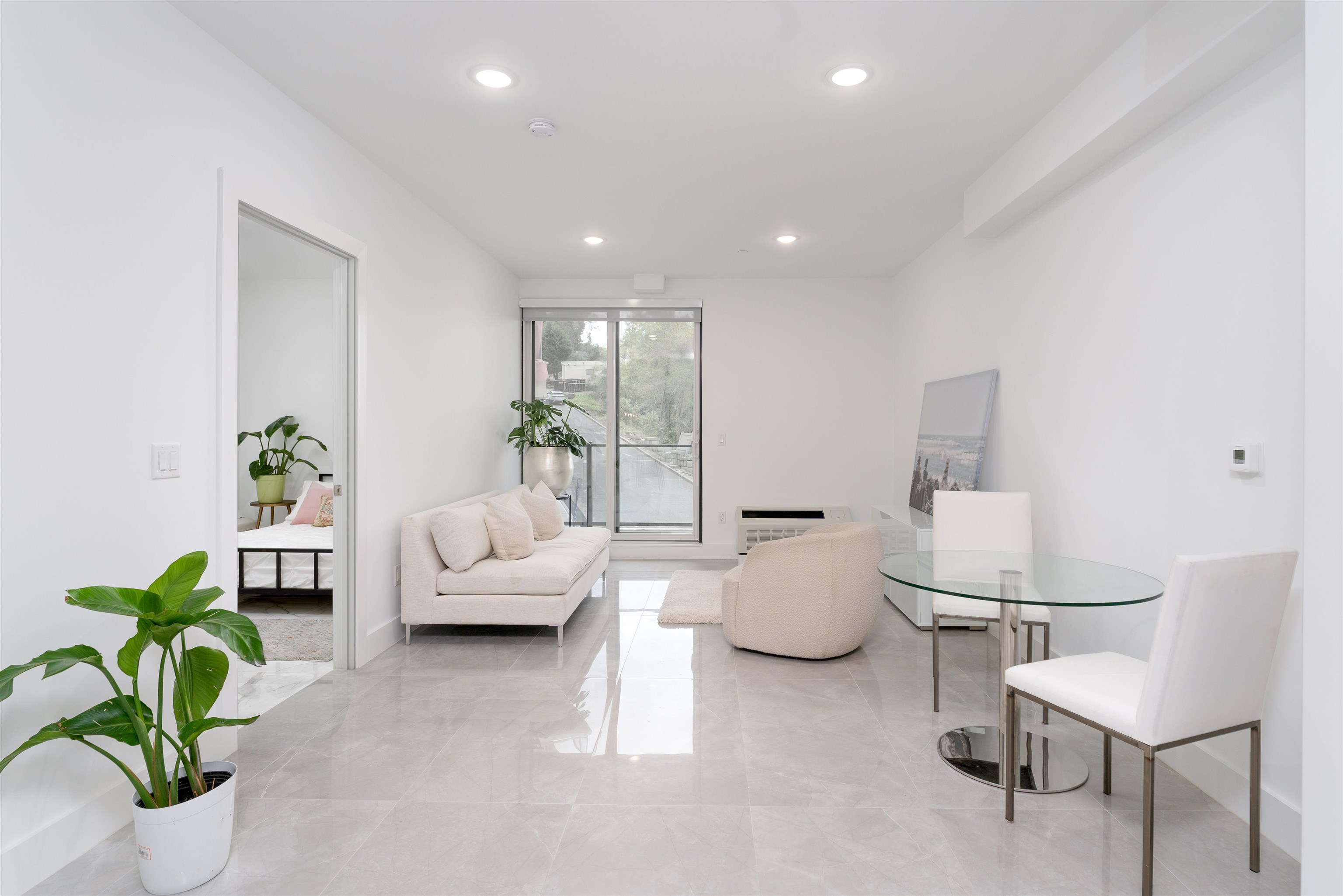 8621 River Road, Unit 3D North Bergen, NJ 07047 - Photo 2 of 22 a living room with furniture and a potted plant