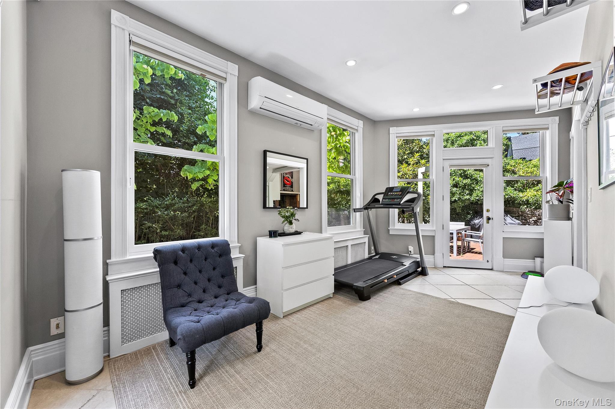 19 Howe Place Bronxville, NY 10708 - Photo 15 of 37 Sun room with access to back patio.