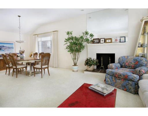 69 Wayne Road Newton, MA 02459 - Photo 2 of 2 a living room with furniture and a fireplace