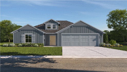 5660 Drake Drive Orange, TX 77632 - Photo 2 of 15 a front view of a house with a yard and garage