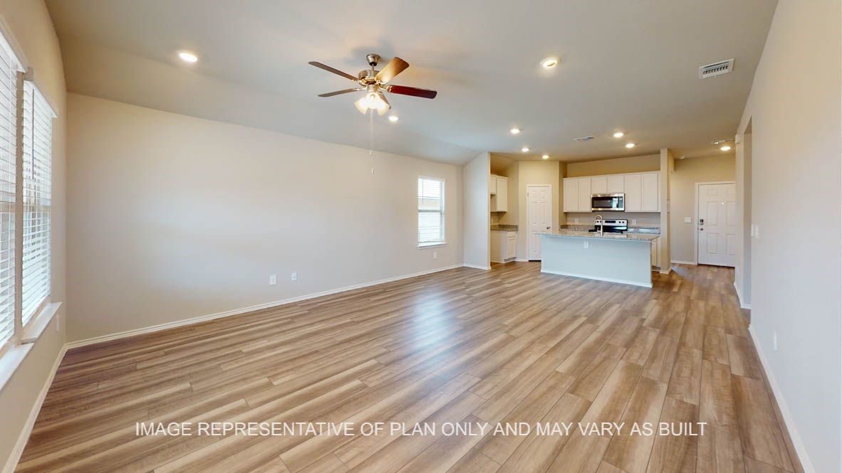 5660 Drake Drive Orange, TX 77632 - Photo 6 of 15 a view of empty room with wooden floor and window