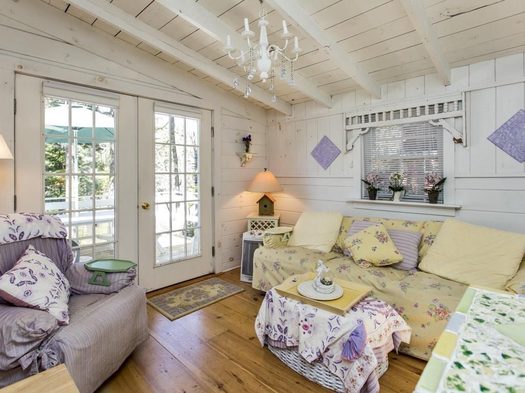 91 Samoset Trail East Boothbay, ME 04544 - Photo 5 of 29 The living room with French doors to...