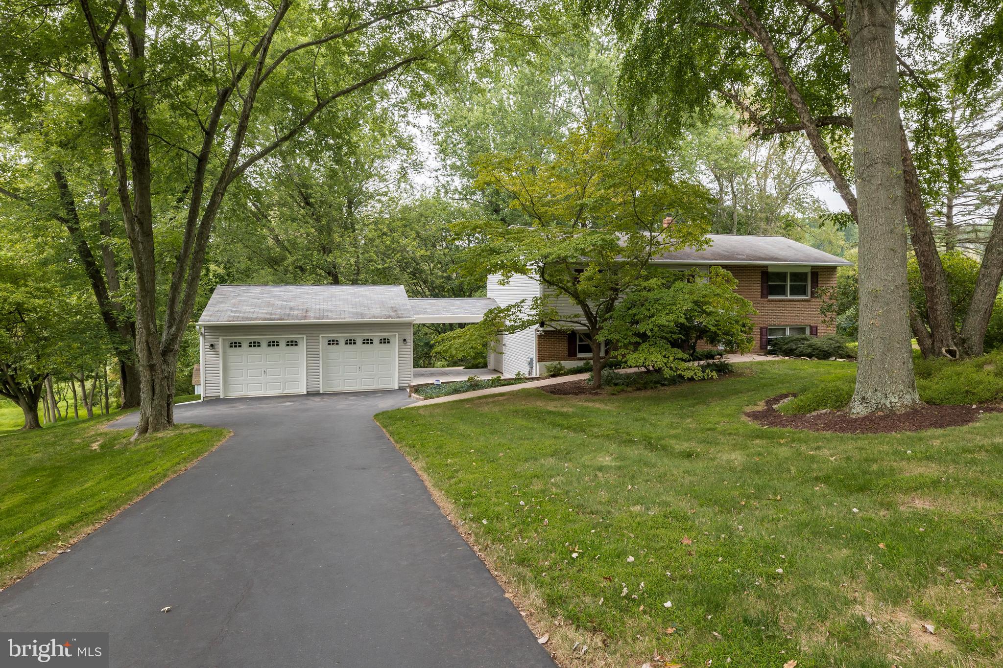 609 Spring Line Drive West Chester, PA 19382 - Photo 2 of 38 Tree-embraced Beauty!