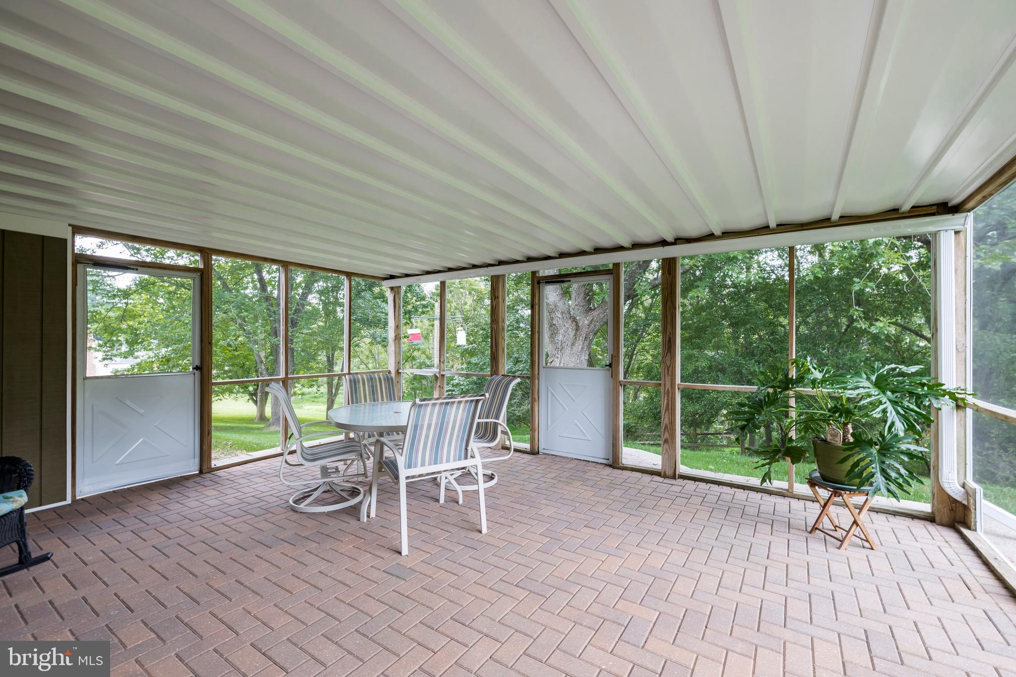 609 Spring Line Drive West Chester, PA 19382 - Photo 26 of 38 Delightful screened patio adjoins the family room!