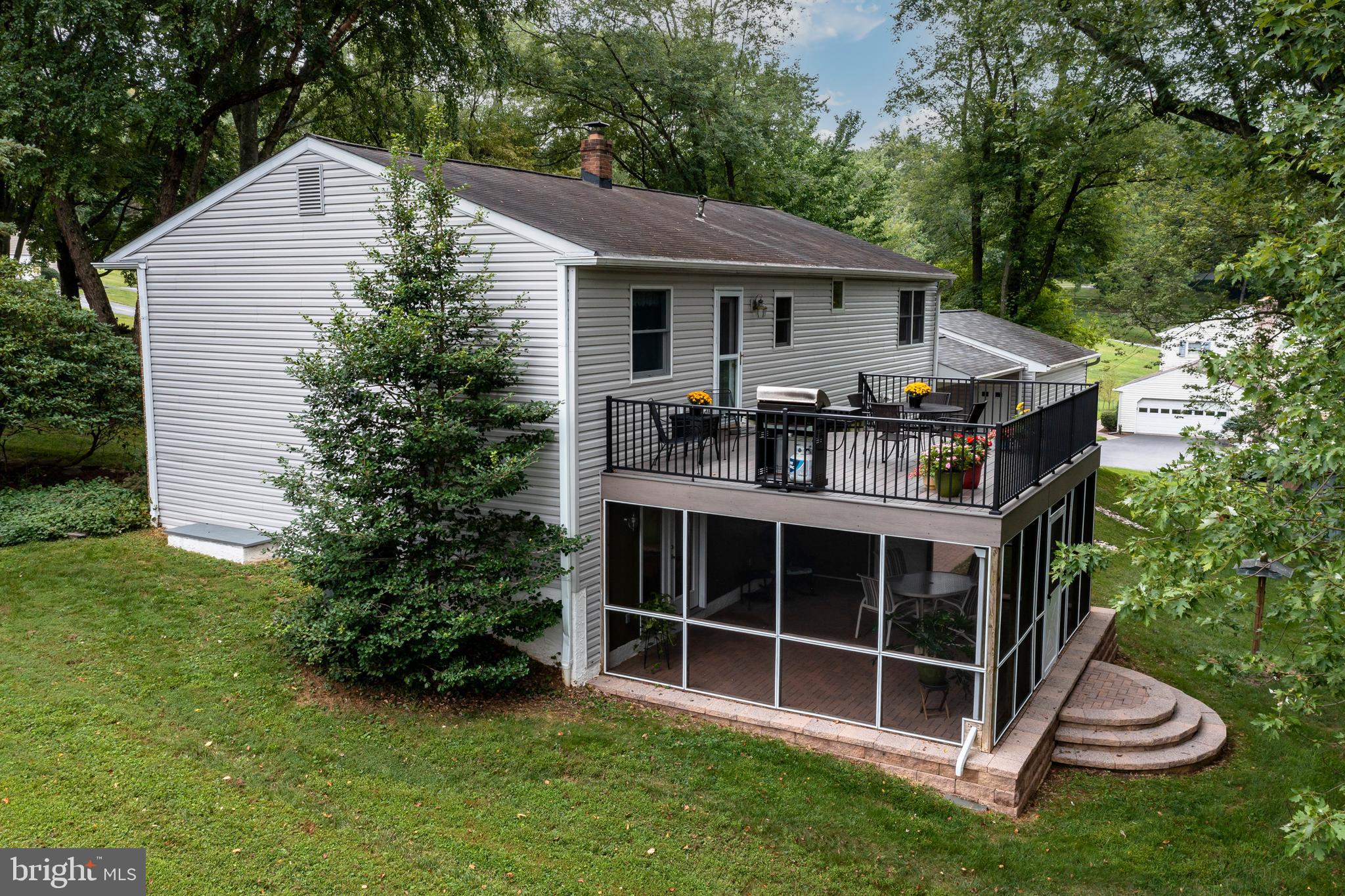 609 Spring Line Drive West Chester, PA 19382 - Photo 29 of 38 Lush landscaped yard adds to the outdoor fun space