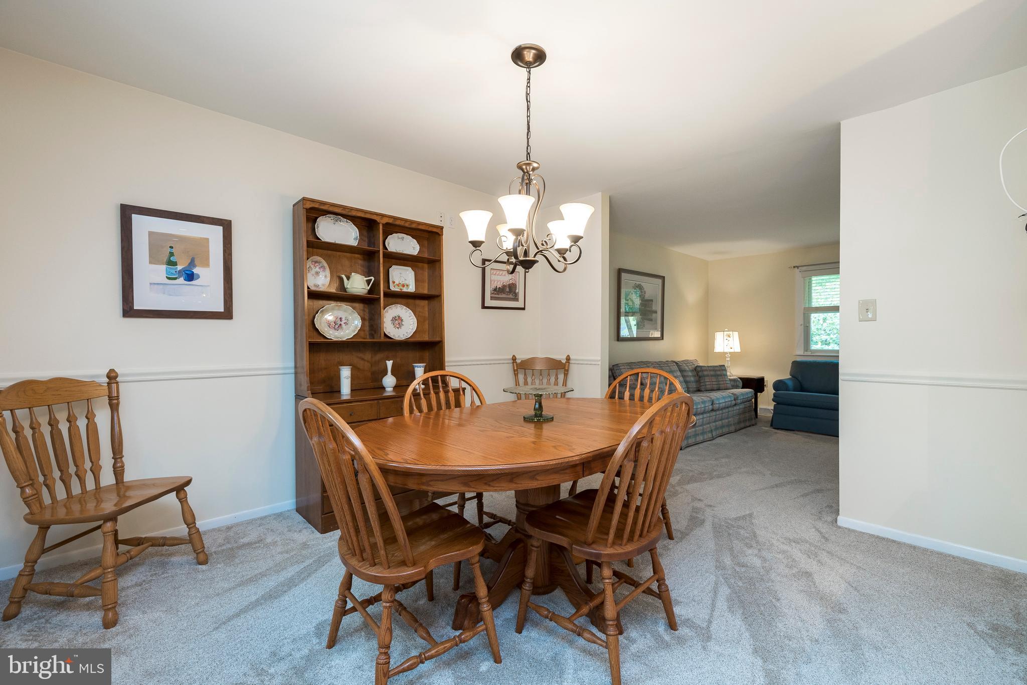 609 Spring Line Drive West Chester, PA 19382 - Photo 8 of 38 Gracious Formal Dining Room with chair rail!