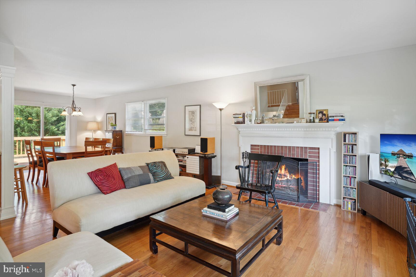 7011 Hector Road McLean, VA 22101 - Photo 4 of 20 a living room with furniture and a fireplace