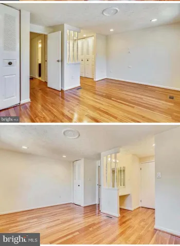 a kitchen with stainless steel appliances granite countertop a sink and a refrigerator