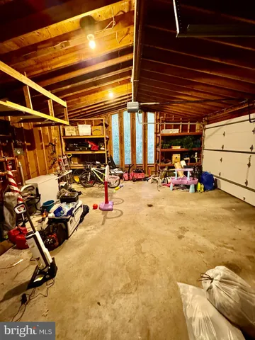 a bathroom with a double vanity sink a mirror and a