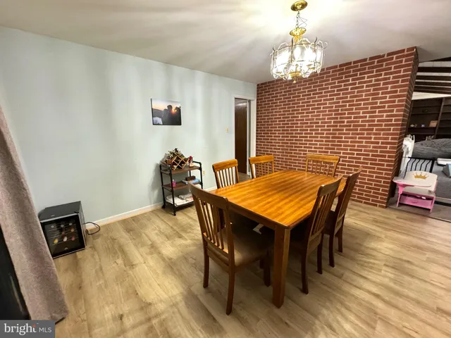 a bathroom with a toilet and a shower curtain