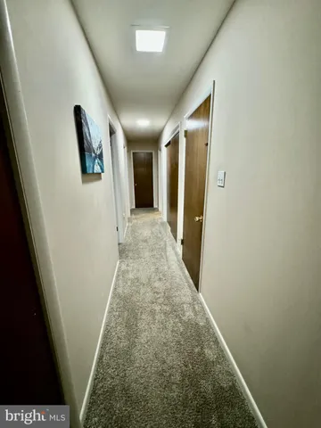 a view of storage and utility room