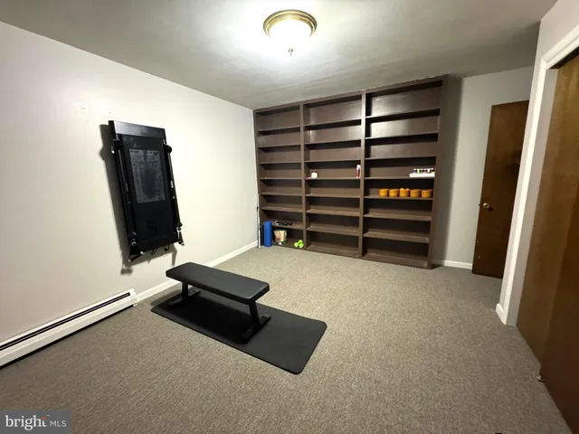 a bathroom with a sink vanity and a mirror