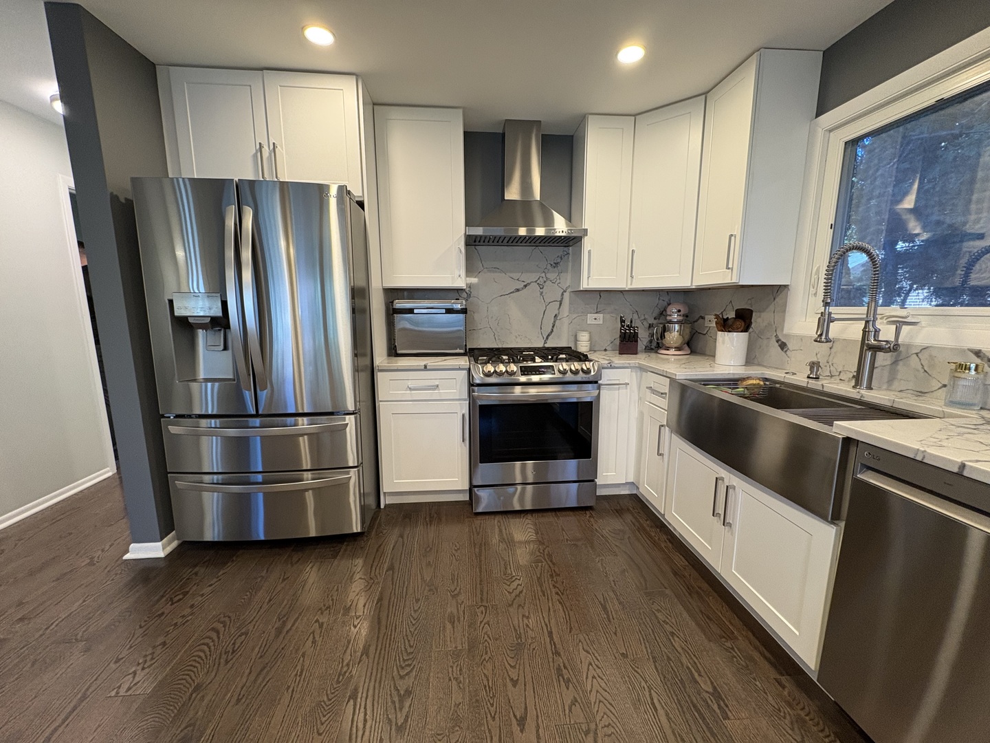 1100 Potter Road Park Ridge, IL 60068 - Photo 14 of 49 a kitchen with stainless steel appliances a refrigerator sink and microwave