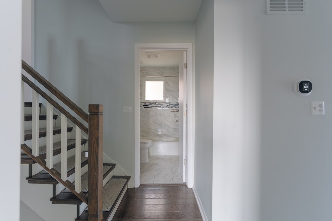 1100 Potter Road Park Ridge, IL 60068 - Photo 23 of 38 a view of an entryway with wooden floor