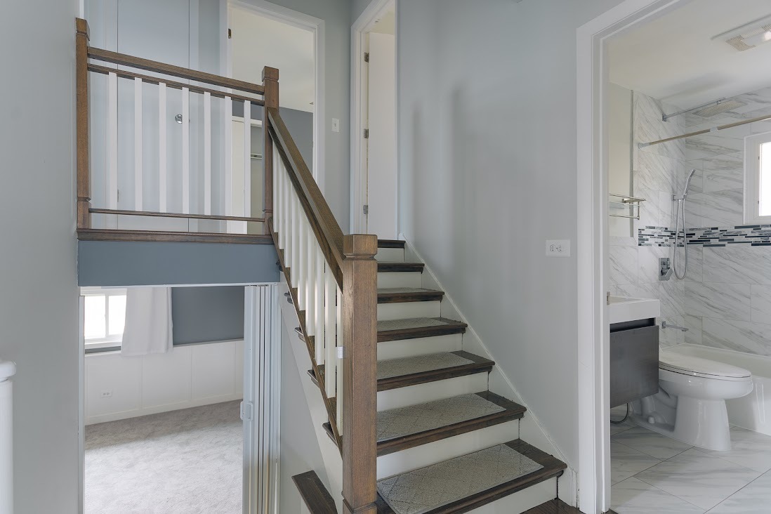 1100 Potter Road Park Ridge, IL 60068 - Photo 24 of 38 a view of entryway and hall with a toilet