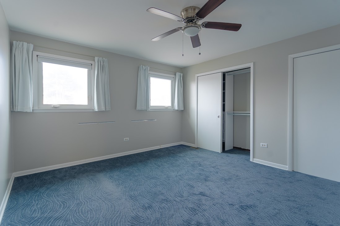 1100 Potter Road Park Ridge, IL 60068 - Photo 31 of 38 a view of an empty room with a window