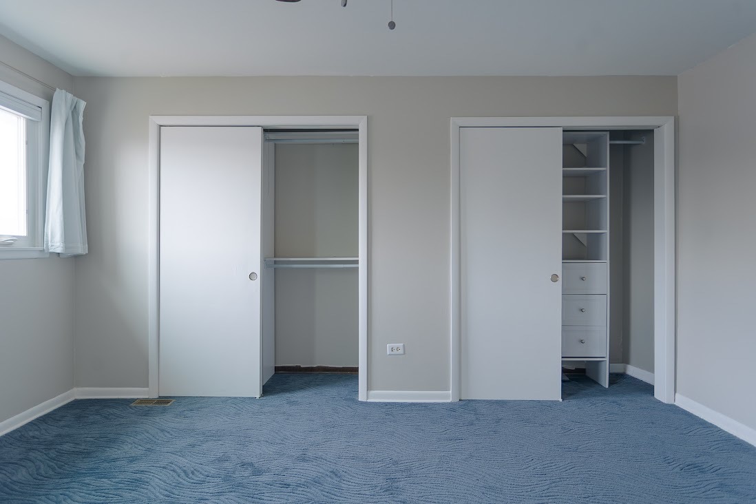 1100 Potter Road Park Ridge, IL 60068 - Photo 32 of 38 a view of an empty room with closet and a window
