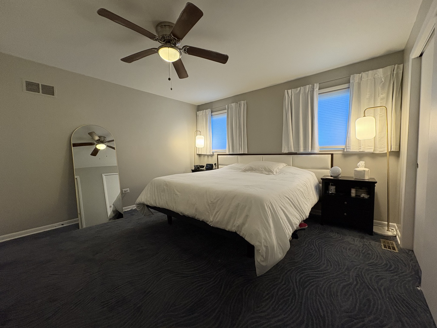 1100 Potter Road Park Ridge, IL 60068 - Photo 34 of 49 a bed sitting in a bedroom next to a window