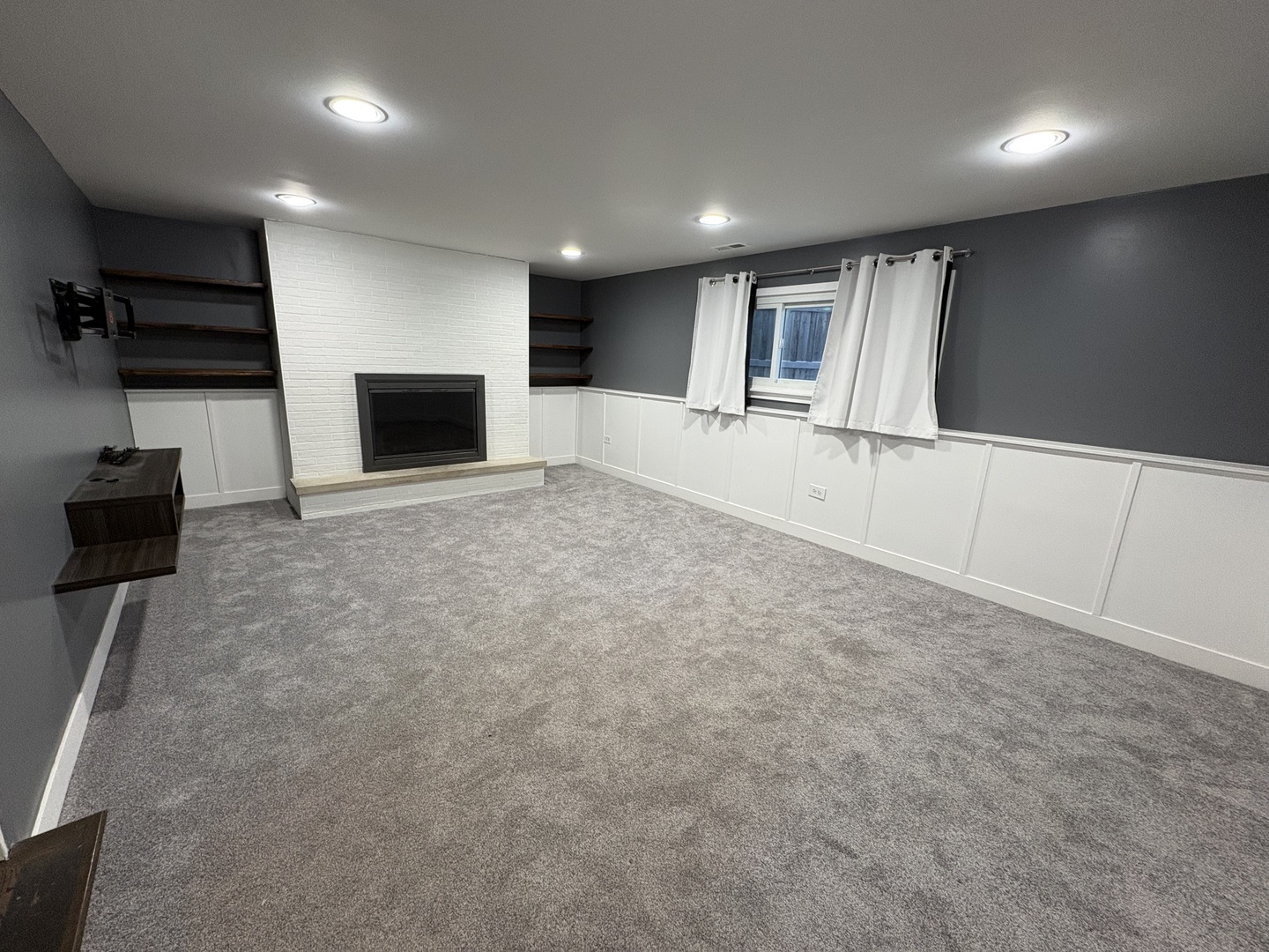 1100 Potter Road Park Ridge, IL 60068 - Photo 39 of 49 a view of an empty room with a fireplace