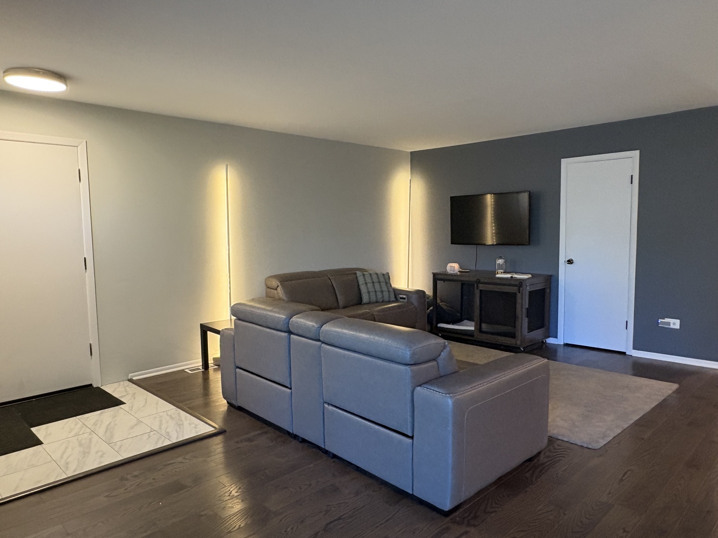 1100 Potter Road Park Ridge, IL 60068 - Photo 4 of 38 a living room with furniture and a flat screen tv