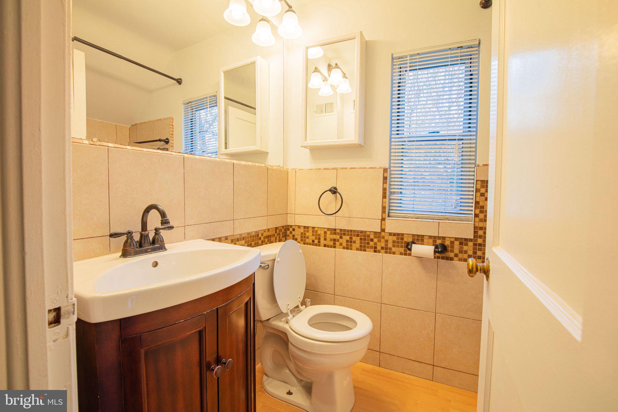 5810 Greenleaf Road Cheverly, MD 20785 - Photo 21 of 29 Charming bathroom with modern touches.