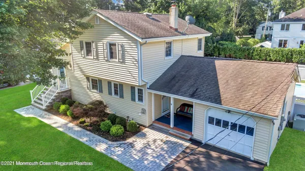 a aerial view of a house with garden