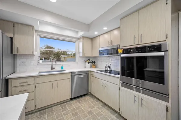 a bedroom with a bed and a cabinets
