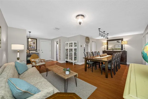 a bedroom with a bed and flat screen tv