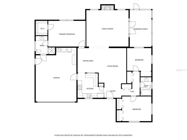 a living room with furniture and a dining table with wooden floor