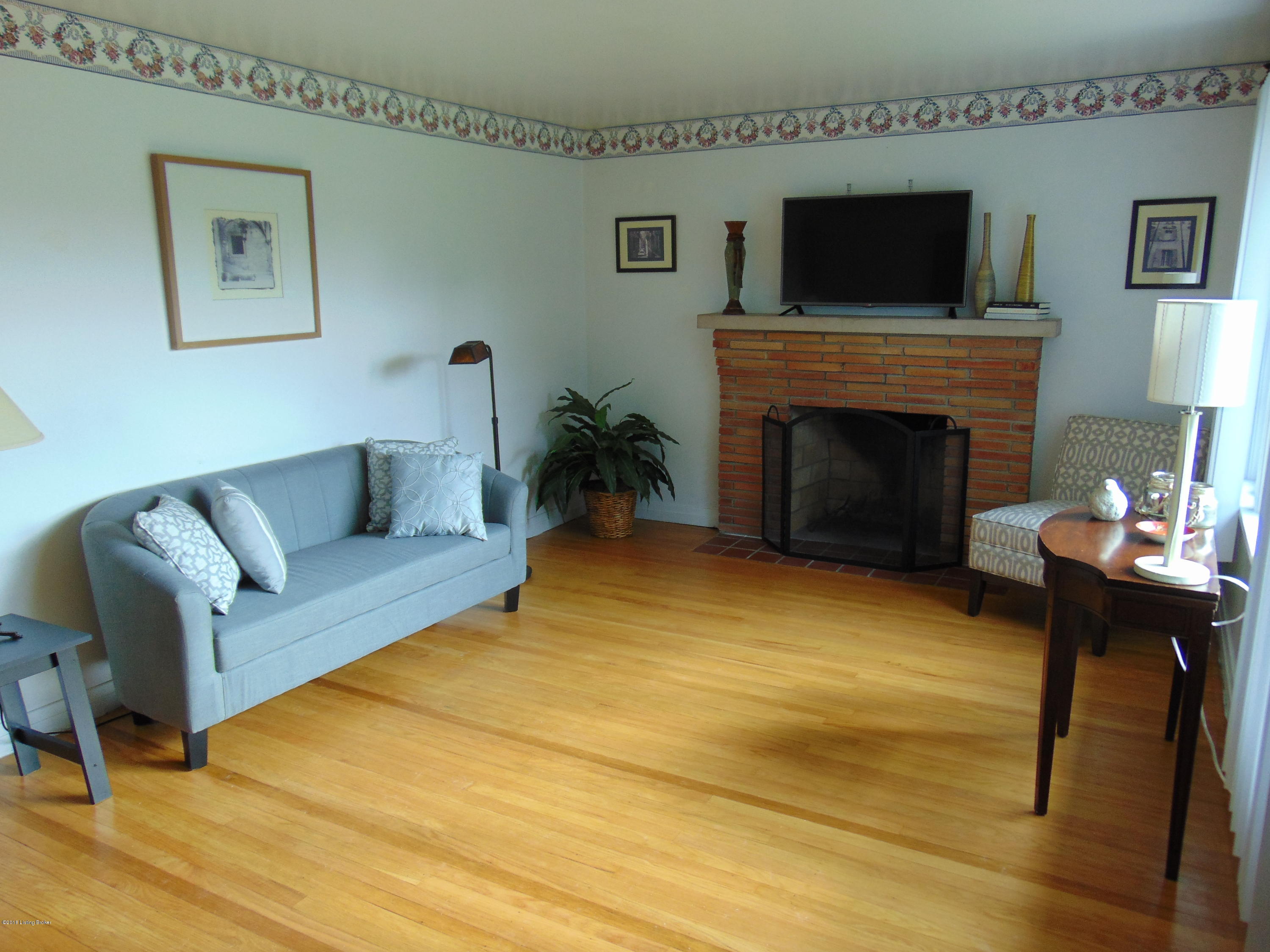 4405 Leeds Road Louisville, KY 40216 - Photo 13 of 58 Original hardwood flooring in the living room