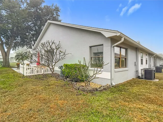 a house with trees in the background