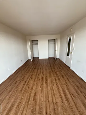 a view of a lobby with black carpet