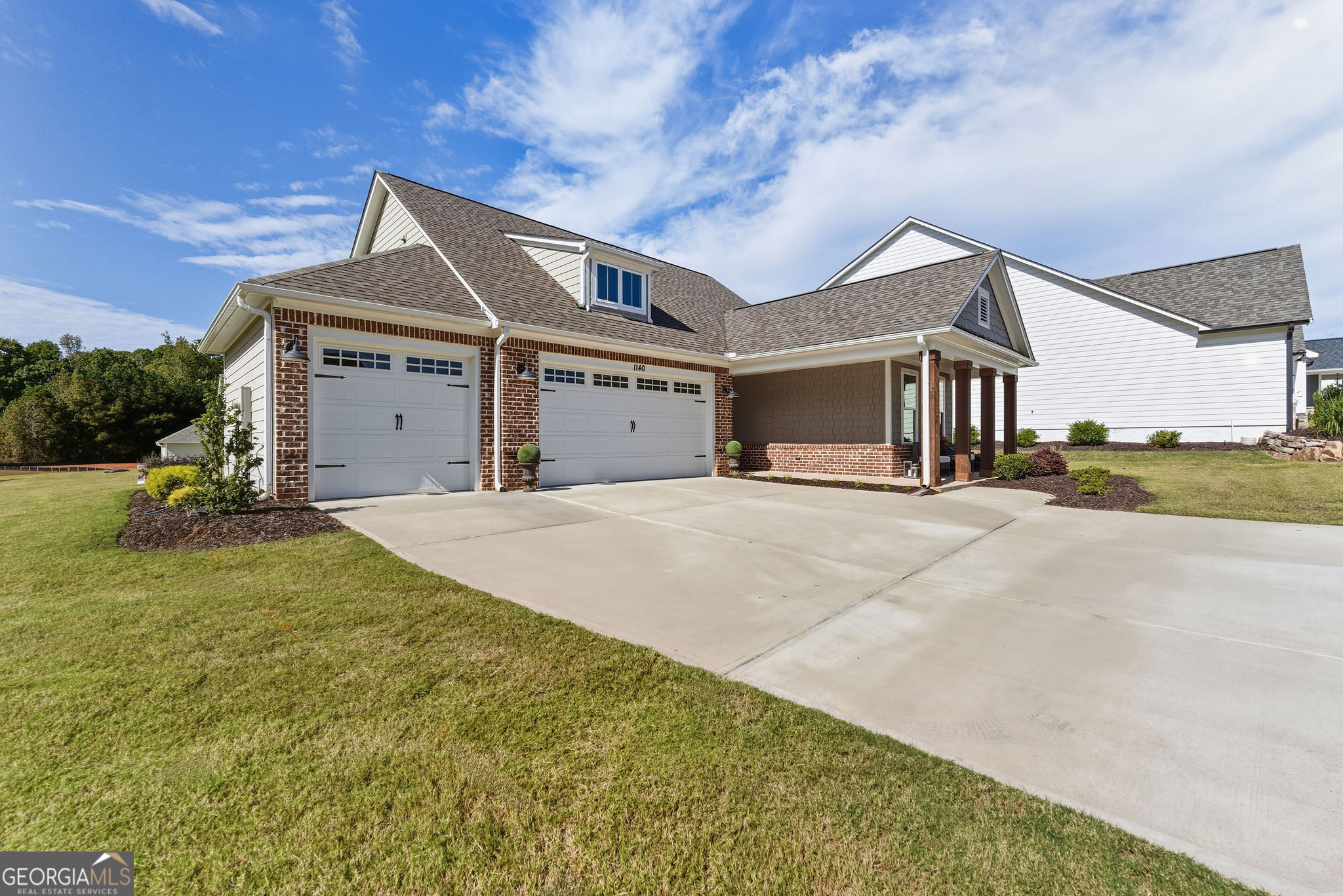 1140 Providence Loop Greensboro, GA 30642 - Photo 1 of 23 a front view of a house with a yard