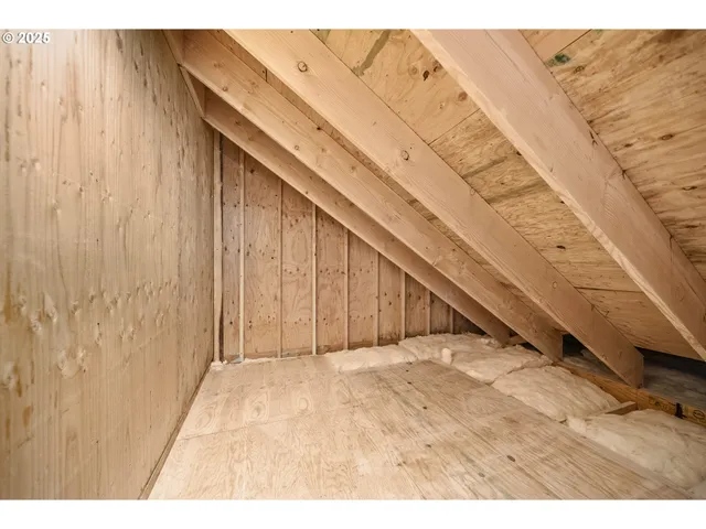 a picture of a bench in a white wall