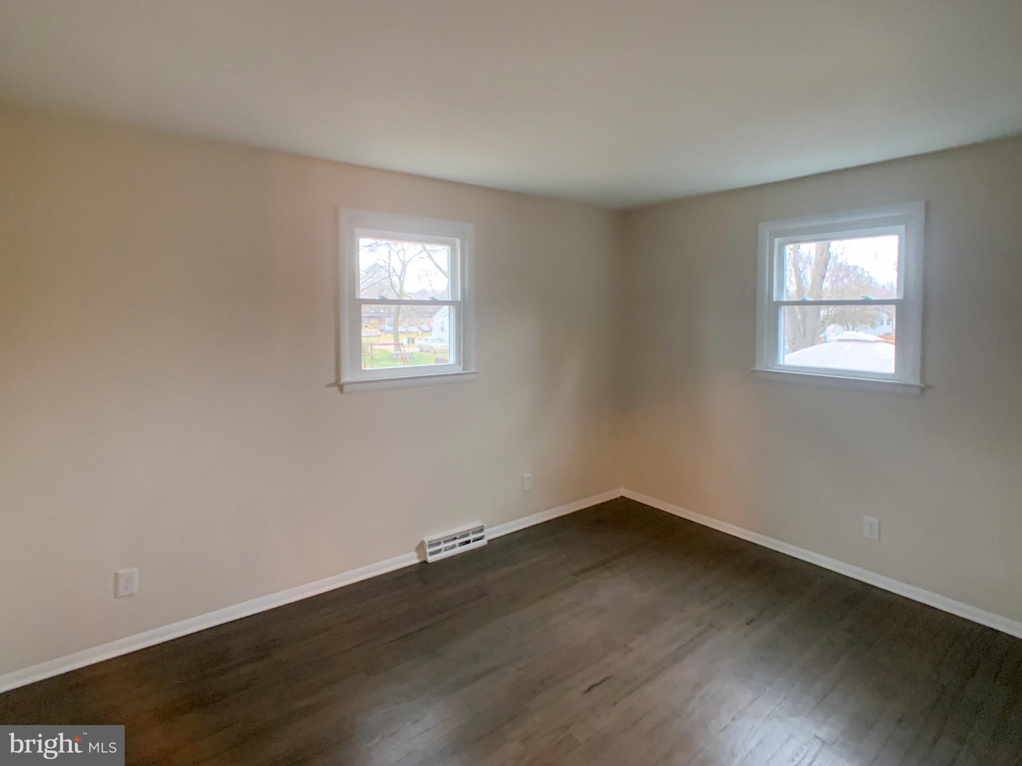 5 Estate Road Pemberton, NJ 08068 - Photo 15 of 25 a view of a room with wooden floor and windows in it