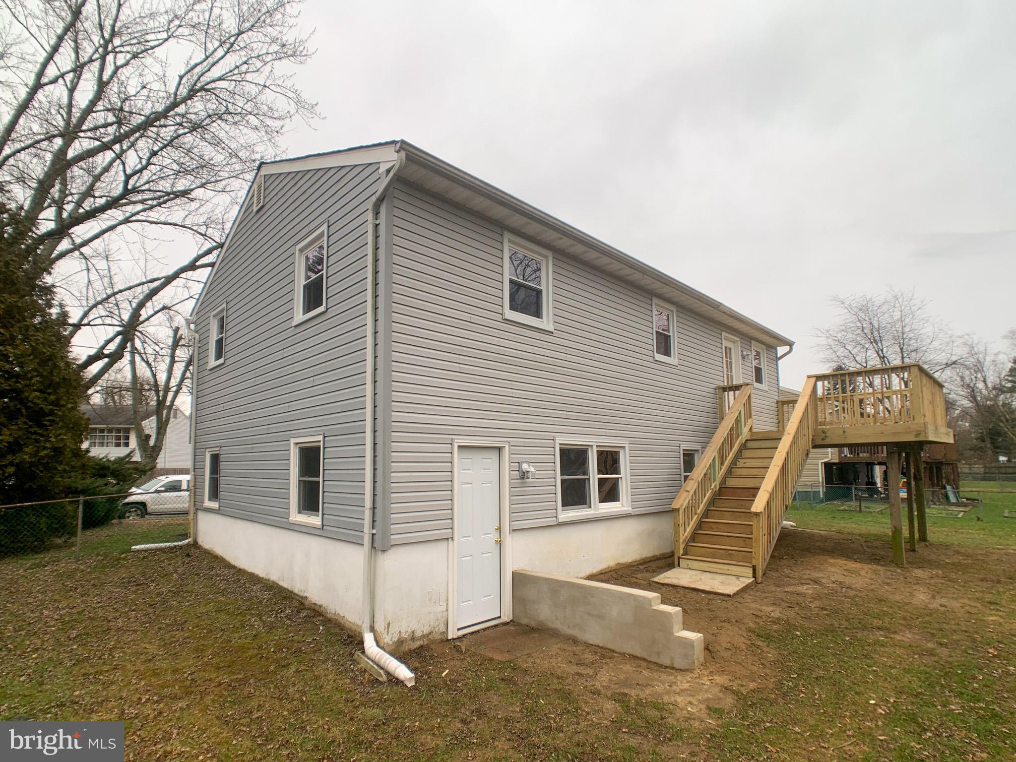 5 Estate Road Pemberton, NJ 08068 - Photo 3 of 25 a view of a white house with a yard