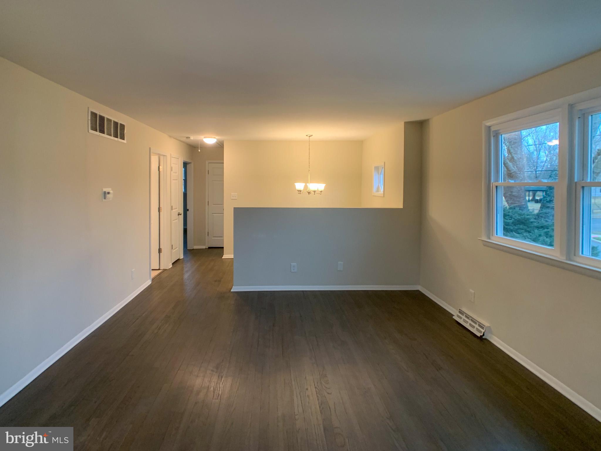 5 Estate Road Pemberton, NJ 08068 - Photo 8 of 25 wooden floor in an empty room with a window