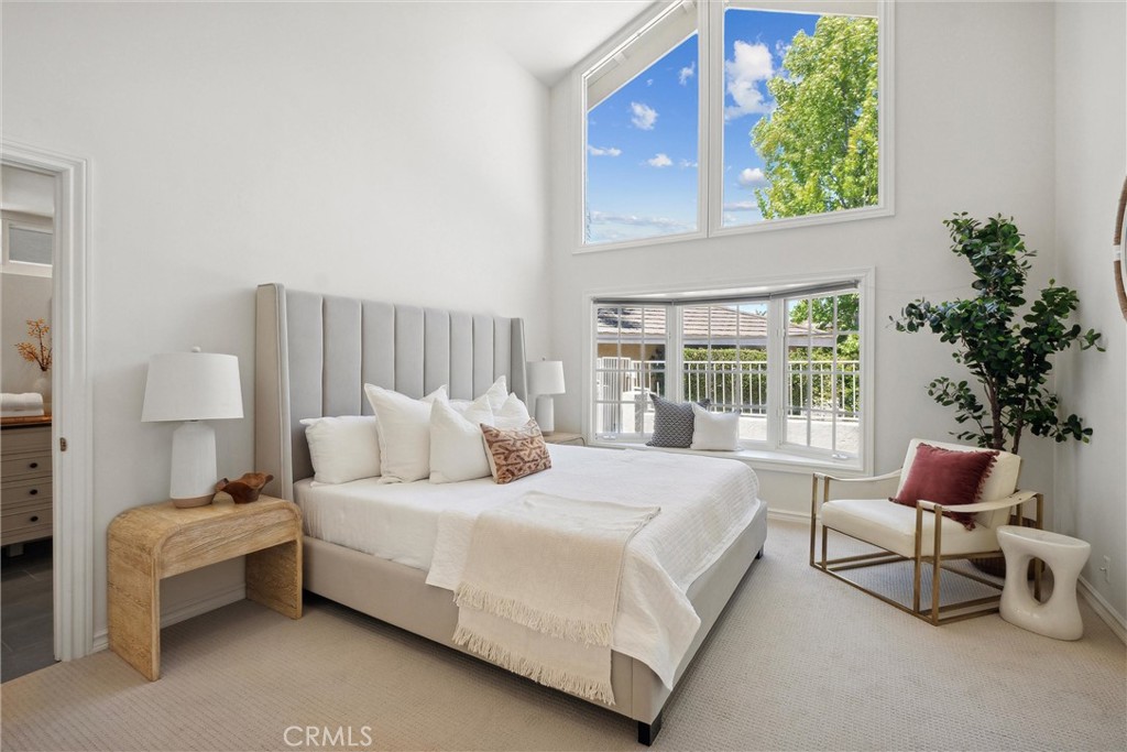 601 Calle Miguel San Clemente, CA 92672 - Photo 21 of 46 a bedroom with a bed chair and window