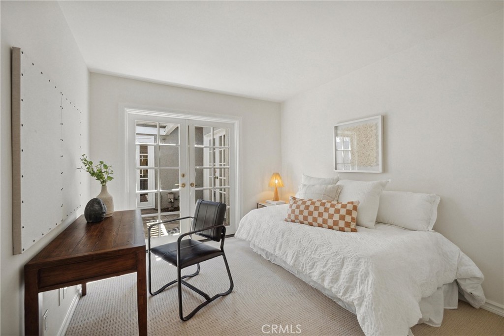 601 Calle Miguel San Clemente, CA 92672 - Photo 28 of 46 a bedroom with a bed and a window