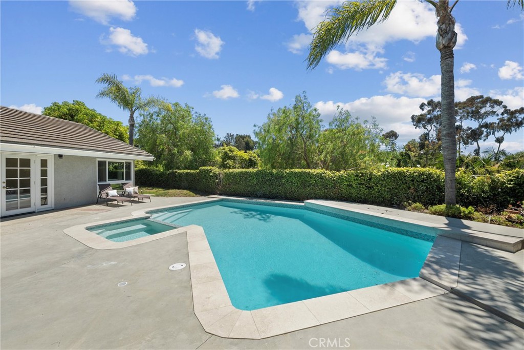 601 Calle Miguel San Clemente, CA 92672 - Photo 32 of 46 a view of a swimming pool with a bench and tables