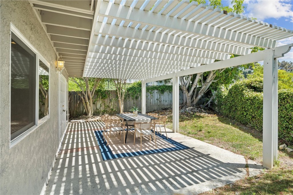 601 Calle Miguel San Clemente, CA 92672 - Photo 35 of 46 a patio with glass windows and table