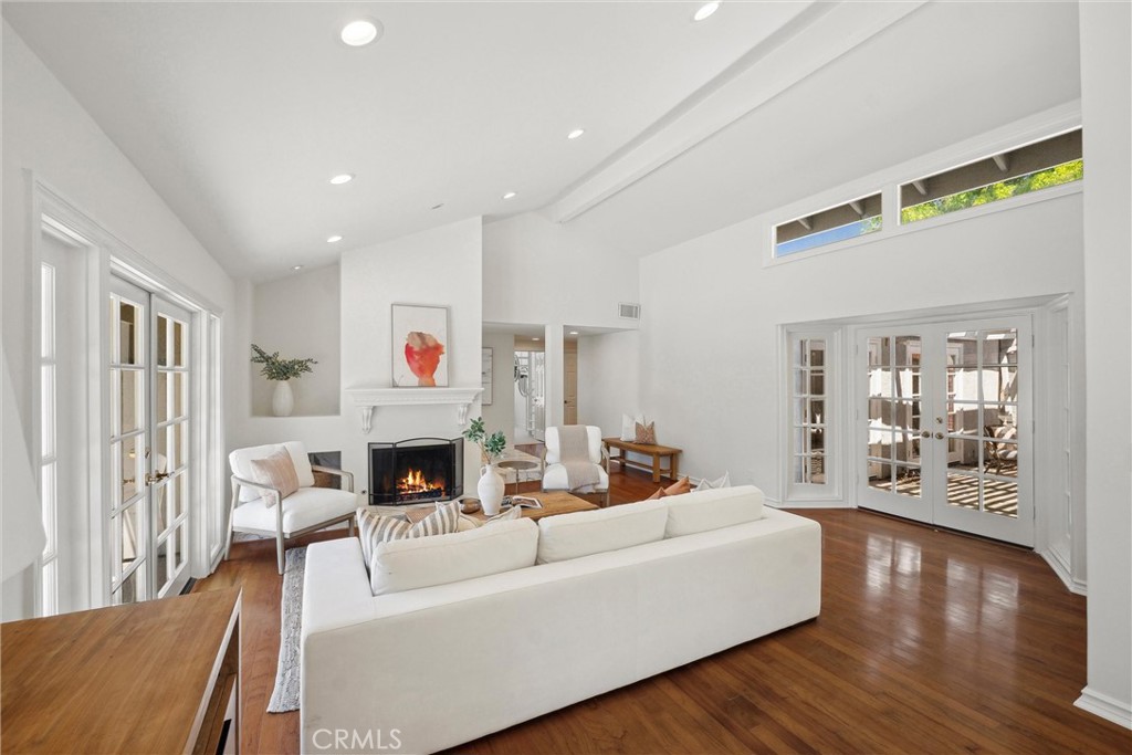 601 Calle Miguel San Clemente, CA 92672 - Photo 6 of 46 a living room with fireplace furniture and a wooden floor