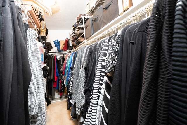1340 North Dearborn Street, Unit 7D Chicago, IL 60610 - Photo 8 of 17 a view of walk in closet with clothes